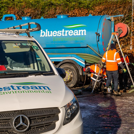 Bluestream trucks cleaning wastewater for wastewater treatment systems installation by BlueStream Environmental